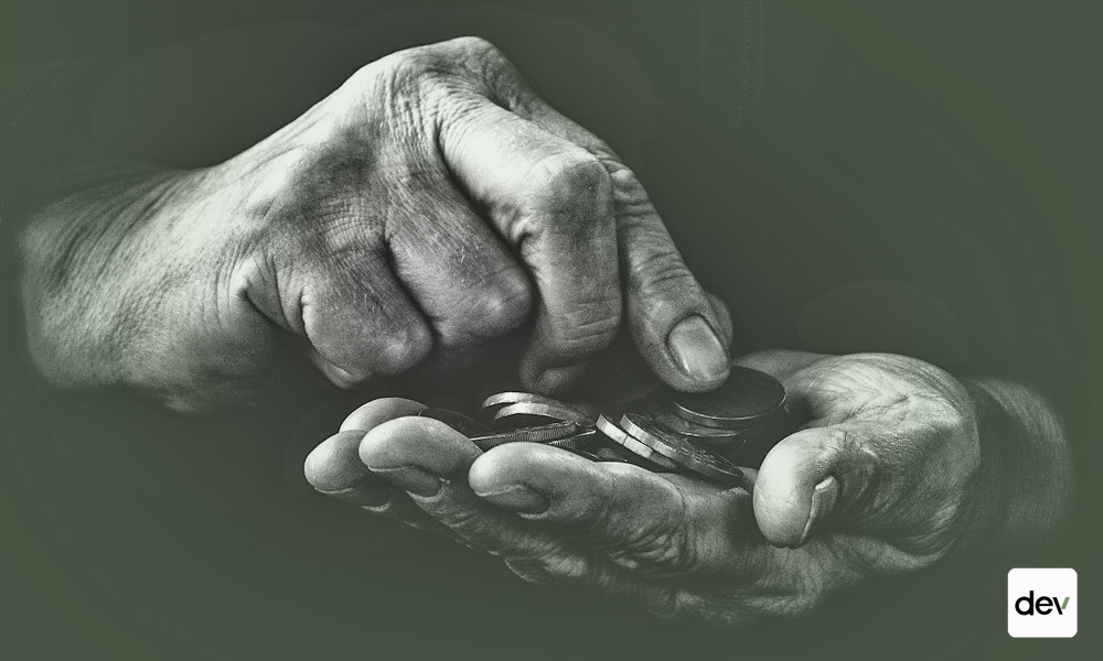 Hand with coins